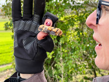 Load image into Gallery viewer, photo showing how eatng is possible with dogloves gloves in situ. no need to remove gloves to eat