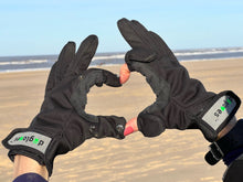 Load image into Gallery viewer, photo showing version 1 of dog walking gloves with press studs to fasten finger flaps with back ground of sea